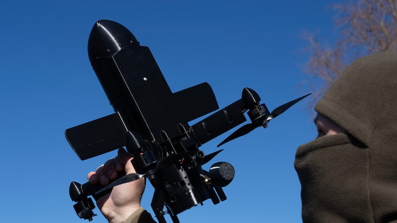 An instructor from the Ukrainian company General Cherry demonstrates the operation of an...