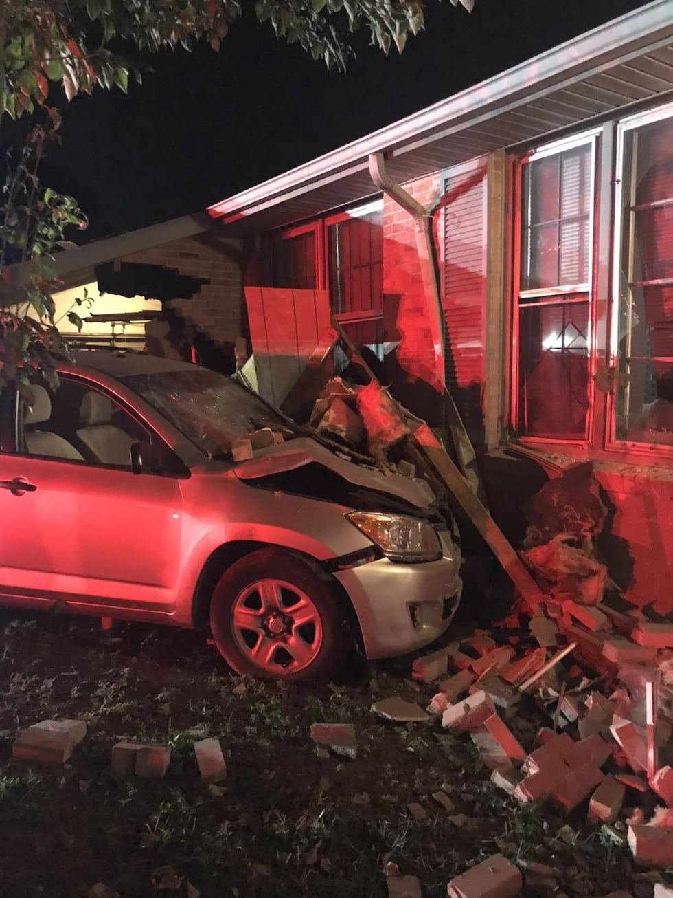 Firefighters evaluated the home and the vehicle and found that no one had been injured.