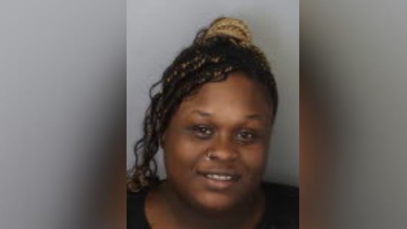 A woman is behind bars after Memphis Police said she ran over the father of her children while...