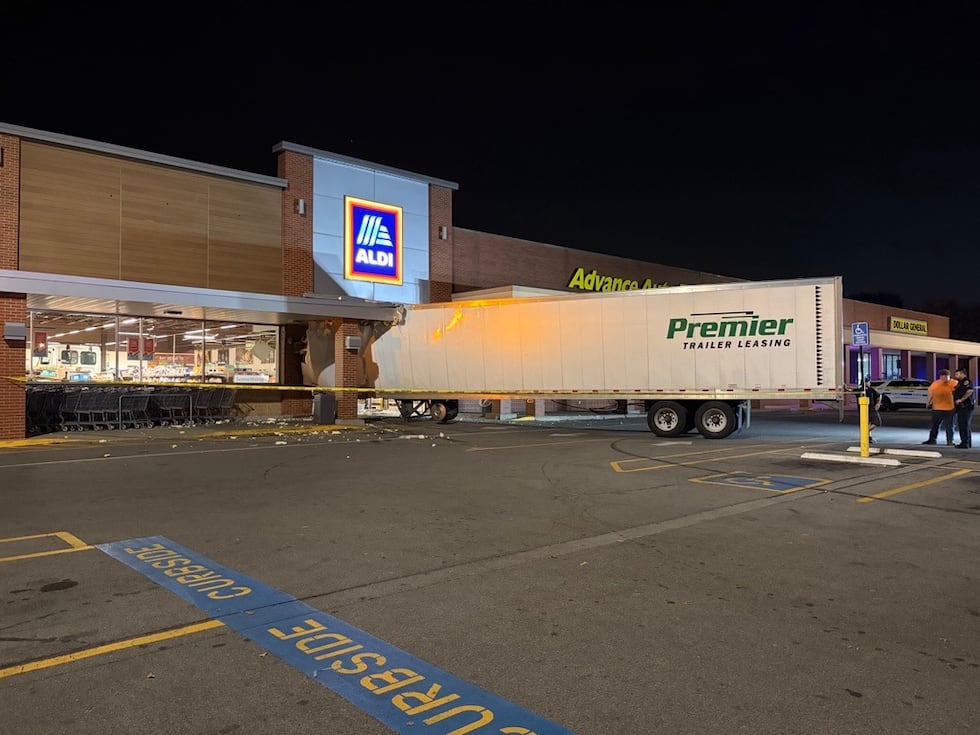 A semi driver is in custody after crashing into an Aldi in East Nashville.
