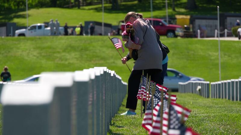 More than 150 volunteers honored the soldiers days ahead of Memorial Day.