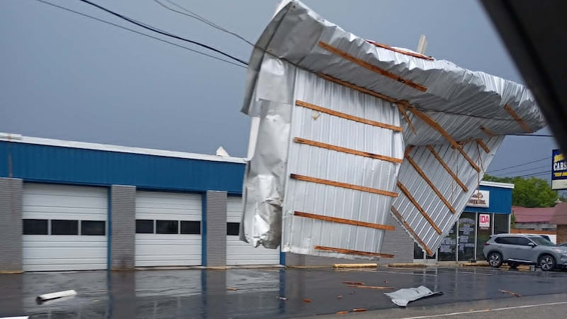 A large piece of metal sheeting was seen wrapped around a power line in Manchester, Tennessee,...