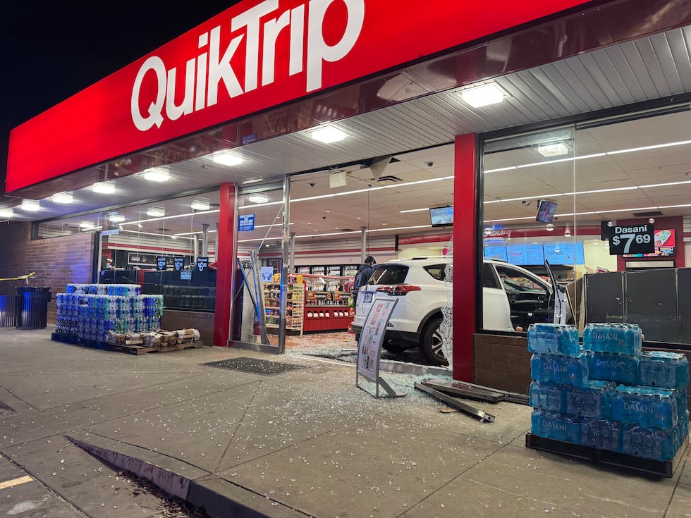 A car crashed into a QuikTriip in Lilburn on Saturday.