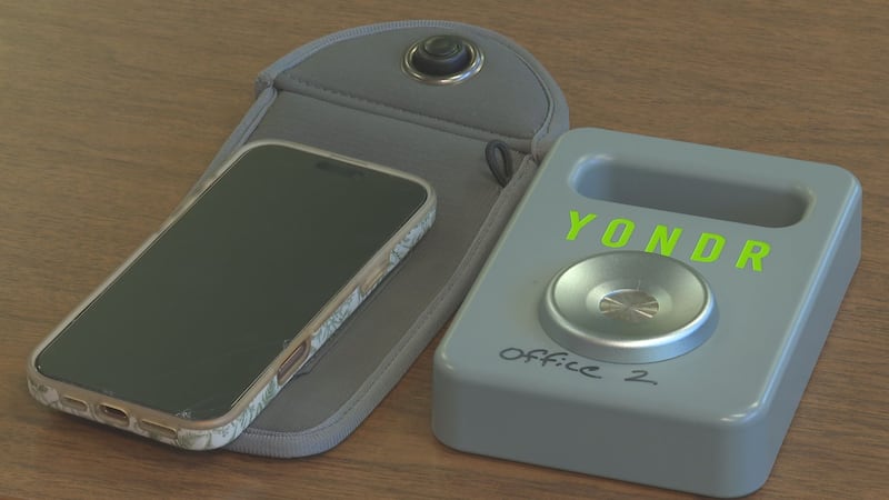 Students arrive at school and put their phones in YONDR pouches. They carry those pouches...