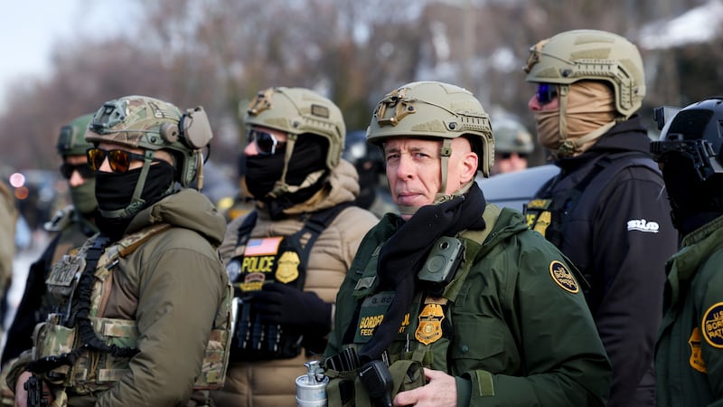 U.S. Border Patrol Cmdr. Gregory Bovino joins federal agents at the scene of a shooting in...