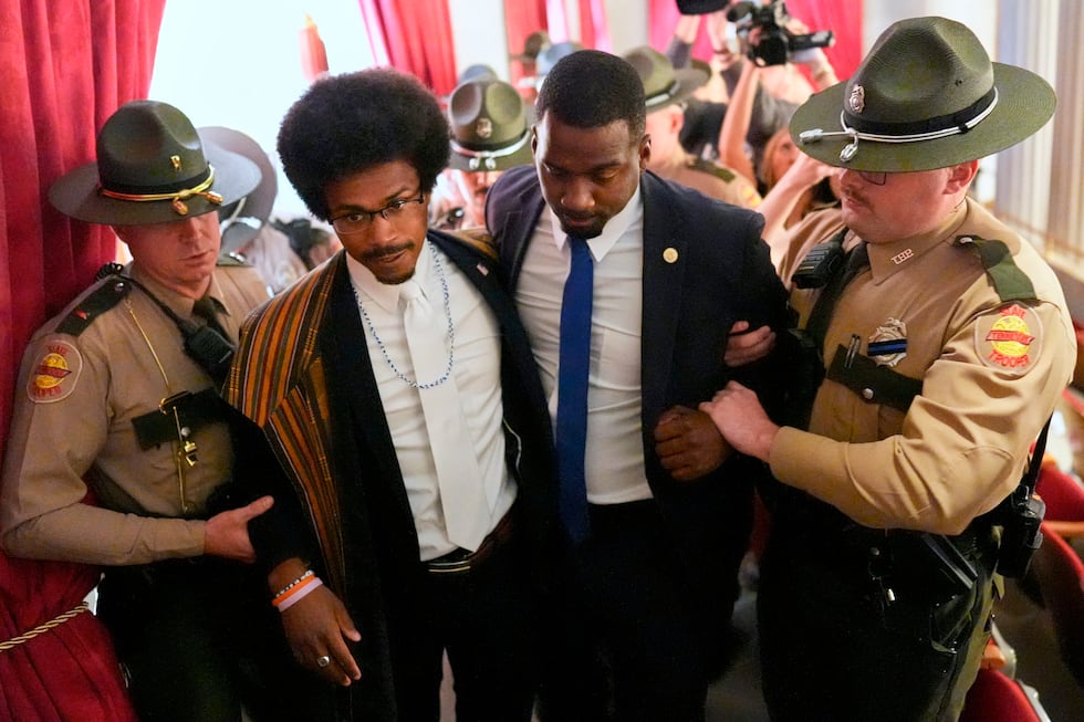 Rep. Justin J. Pearson, D-Memphis, second from left, walks with his brother KeShaun Pearson,...