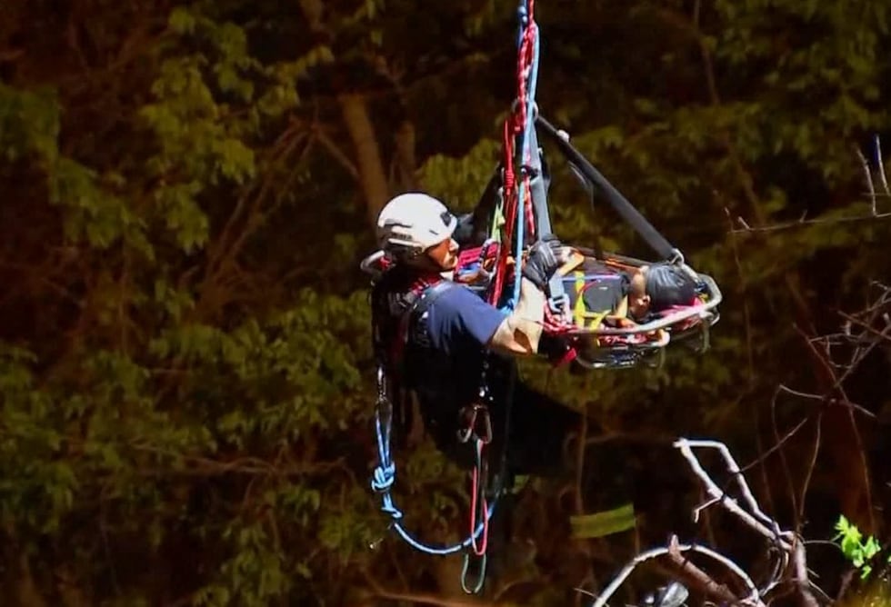 A trespassing suspect was lifted from the riverbank in Nashville.